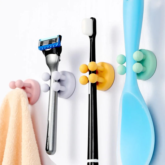 Self-adhesive silicone hook – perfect for holding razors, toothbrushes, and more. Easy to install, keeps your bathroom neat and organized!